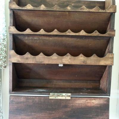 Vintage hanging spice rack with storage.