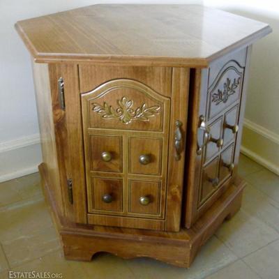 One of two octagonal bedside storage tables.