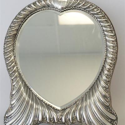 A Fine English Antique Sterling Silver Heart Shaped Dressing Mirror. 19th c., original wood easel back, beveled mirror, ornate script...