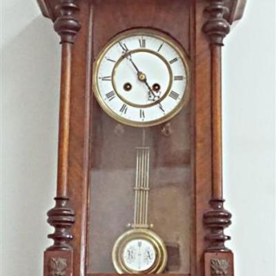 Lot 20 - German Mahogany Wall Clock. Removable pediment, walnut case with applied decoration and turned finials. Porcelain dial with...
