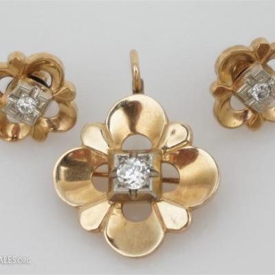 One set of 14kt yellow gold diamond earrings & pendant/brooch jewelry. The brooch measures approx. 0.80
