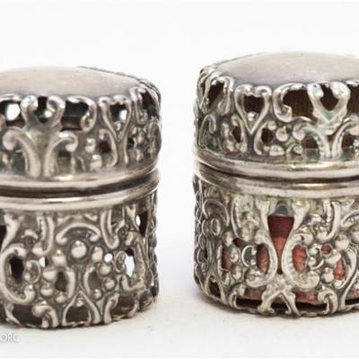 Lot 11 - Two Antique American Sterling Sewing Accoutrements. Both are in matching repoussé openwork design cases with one hinge, snap...