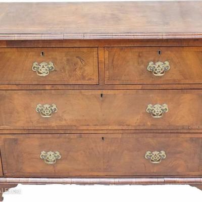 Antique English Chippendale walnut and inlaid veneer four drawer chest. The rectangular top with cross banding above a conforming case....