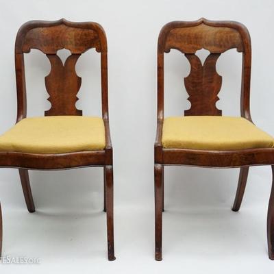 Pair of Gothic Revival Flame Mahogany Side Chairs C. 1860. With characteristic pointed arch openworked back with vertical shaped splats,...