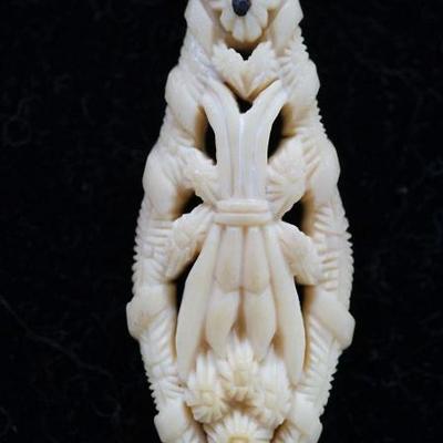 Extremely Intricately Bone Carved Pendant on Sterling Chain