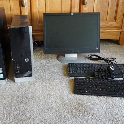 Computers, monitor, and keyboards