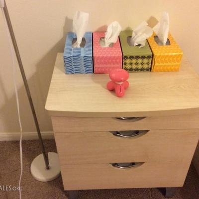 nightstand, lamp, personal massager and tissues