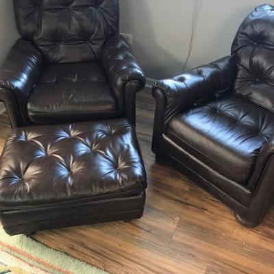 leather chairs and ottoman 