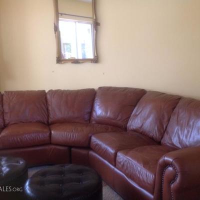 Leather sofa is down filled