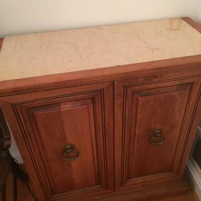 Marble Top Cabinet.
