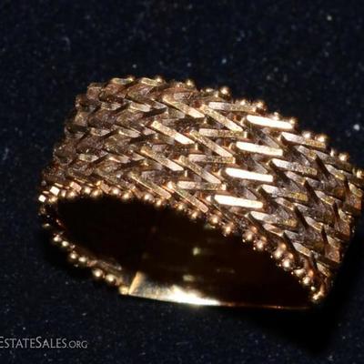 14k yellow gold ring top is articulated, 7.6g 