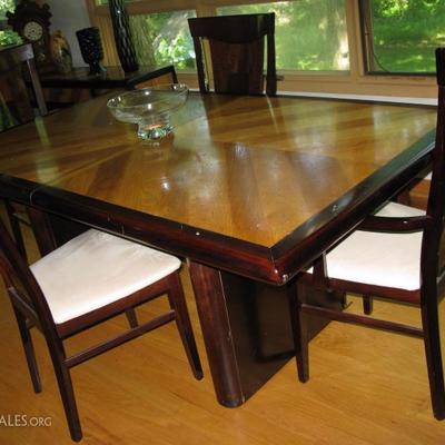 beautiful lacquer finish dining room table with chairs leaves and pads