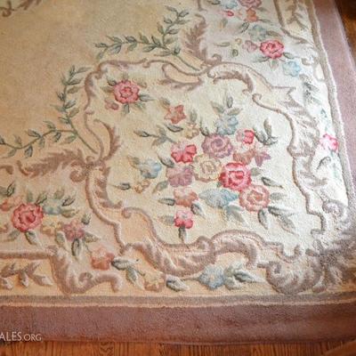 Floral border rug, approximately 8'6