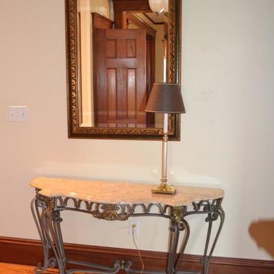Marble top console table and beveled glass mirror