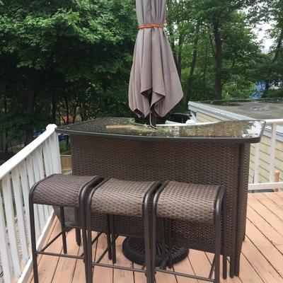 Outdoor bar with 3 stools