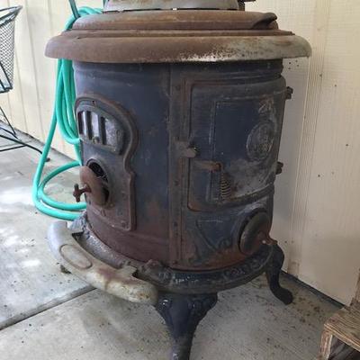 Antique wood stove, lots of character!