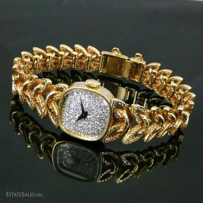 Vintage 14K Gold Diamond Longines Wittnauer Wristwatch Solid14K Yellow Gold Watch with a Diamond Pave Face. Back and clasp on the band...