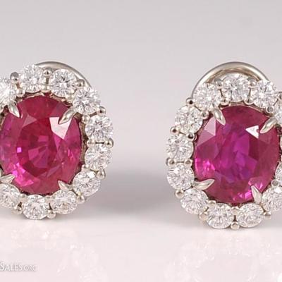 Appraised Retail Value: $220,000. Asking: $120,000. Platinum and 18K gold ruby earrings - 7.74 cts total weight with 26 round brilliant...