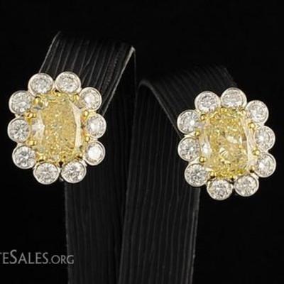 Appraised Retail Value: $ 220,000. Asking: $120,000. 18K yellow and white gold fancy yellow radiant diamonds earrings - 4.61cts and...