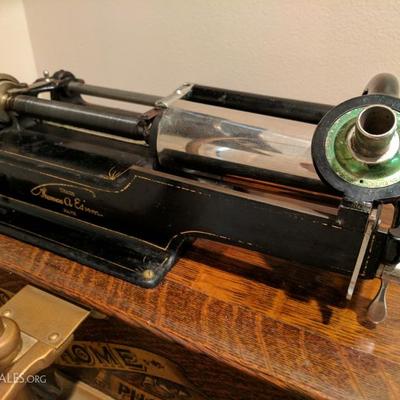 A truly rare find! Working Edison Home Phonograph complete with horn, crane, and claw foot cylinder case with over 100 cylinders!...