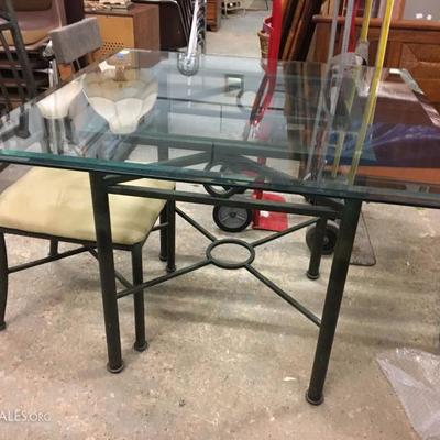 glass table and matching chairs 