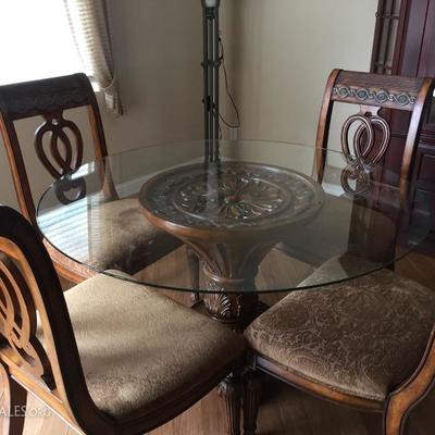 Glass Top Dining Table measures 54