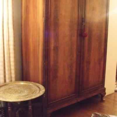 Vintage lighted Armoire w/mirror and glass shelves.