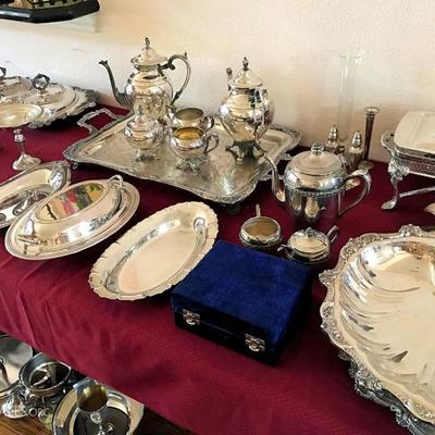 Silver plate tea service, serving dishes, and more