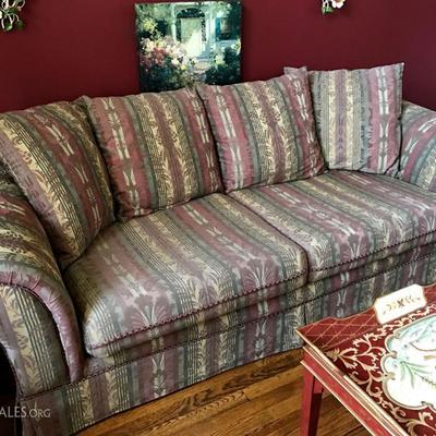 Plum colored sofa