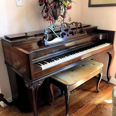 Clean piano with bench