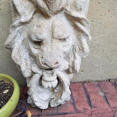 Yard art/lions head