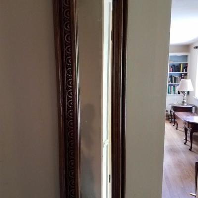 Engraved mirror. Nice accent for a hallway.