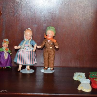 Antique Dutch dolls. The stands are marked with A Kaiser Chicago. 