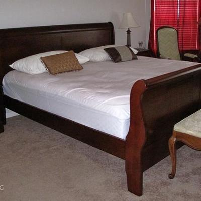 Another View: Cherry Bedroom Suite: King-size Sleighh Bed, Double Dresser Night Stands (2 ea.).  Also shown is a Bench with Tapering...