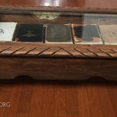 Shadow Box Showcase Coffee Table with a collection of A&M Year Books dating from 1909.  The Hefners have a collection of A&M Year Books...