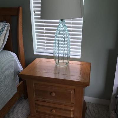 wood night stand, elegant glass lamp