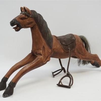 Lot 8 - Wood Rocking Horse with a real horse hair tail. He is without the rockers. Measures 23