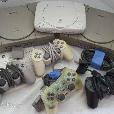 FSL216 Vintage Sony PlayStations, Import & Four Controllers

