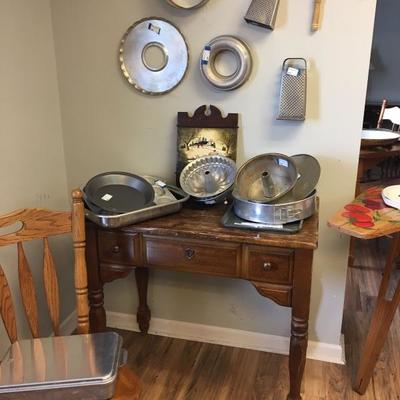 side table with baking dishes 