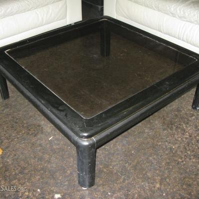 black lacquer and glass coffee table