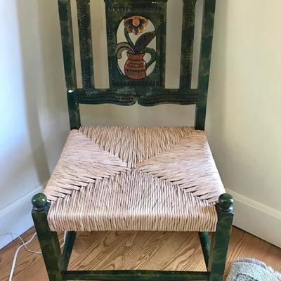 Painted side chair with caned seat.