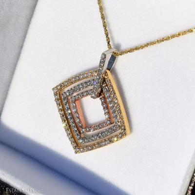 Tri-Colored Gold Movable Pendant with Pave Set Diamonds - 8.1 grams 14 kt. yellow gold, approximate total diamond weight 1 1/2  kt...