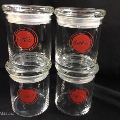 Glass Coca-Cola canisters