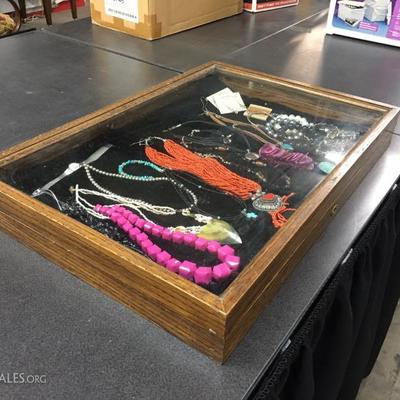 Jewelry with glass case