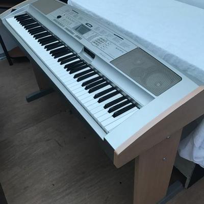Yamaha portable piano. Also includes piano seat 