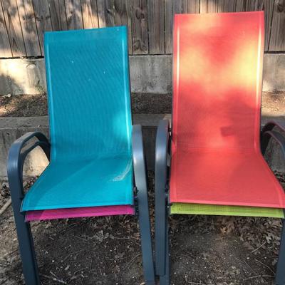 Set of 4 patio chairs. 4 different colors.