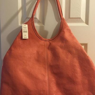 Talbots pink leather purse with tags on it