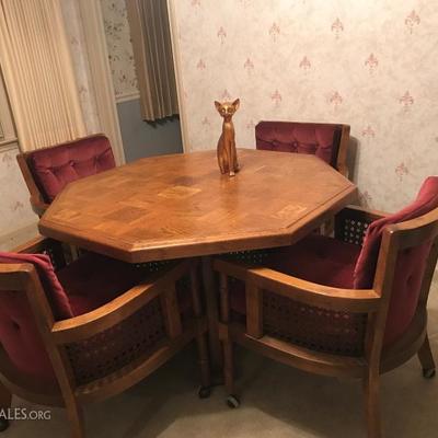Octagonal table with club chairs