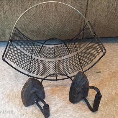 Wrought iron baskets, antique irons