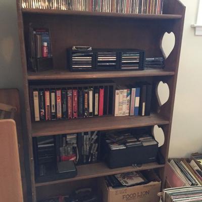 CDs, VHS and bookshelf
